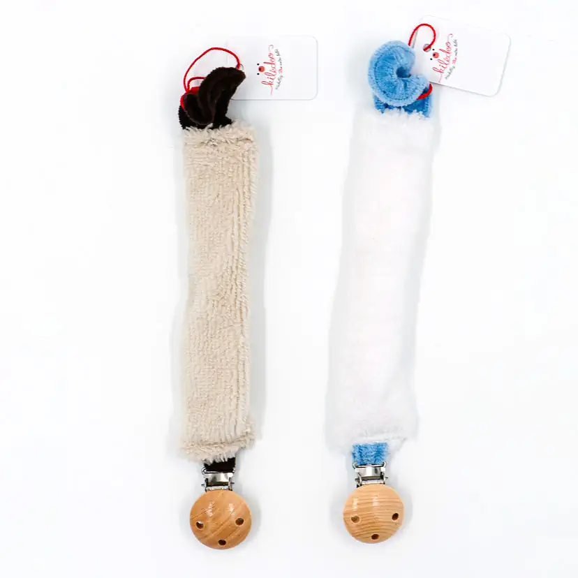 10.Attache-tétines beige et blanc